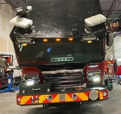 Emergency vehicle undergoing accident repair to restore structural integrity, safety systems, and operational readiness.