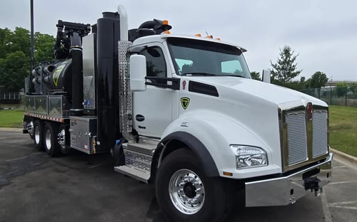 Front passenger side angle view of 2026 TRUVAC HXX hydro excavation truck