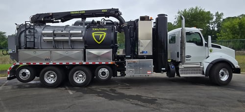 Passenger side profile of 2026 TRUVAC HXX hydro excavator truck