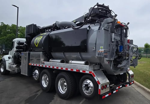 Rear driver side angle view of 2026 TRUVAC HXX hydro excavator truck