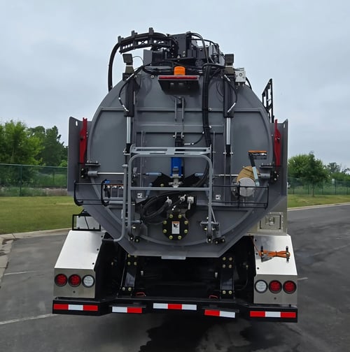Rear view of 2026 TRUVAC HXX hydro excavation truck debris tank and rear door assembly